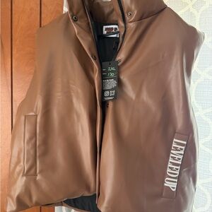 Leveled Up Buffalo 2XL Tan rhinestone faux leather vest. Brand new with tags.